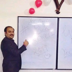 Faculty teaching at the whiteboard